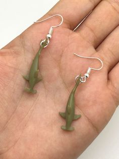 🦈 Mini Hammerhead Shark Earrings 🦈 FREE shipping on orders over $35! Fast shipping within the U.S. These beautiful shark earrings are handmade and hand-painted with love + care. Realistic and adorable shark earrings that make a perfect gift to yourself or anyone loved one that appreciates sharks! *Hypoallergenic earring wires and hooks *Sustainable + recycled packaging *Handmade + unique earrings These are the perfect vibe for Summer 2022 🌊🌞 Treat yourself or give as a gift! If you have any questions please do not hesitate to contact us :) Adorable Shark, Shark Jewelry, Packaging Handmade, Shark Earrings, Novelty Earrings, Shark Necklace, Hammerhead Shark, Nature Necklace, Earring Wires