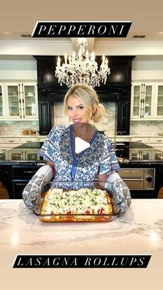 a woman sitting at a kitchen counter with a pizza in front of her and the caption, lasagna roll ups