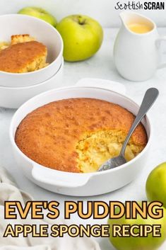 an apple pudding in a white bowl with a spoon next to it and two green apples on the side