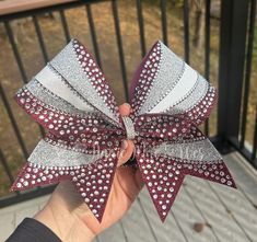 Size: 1 Large 7" x 7" cheer bow made from 3 inch grosgrain ribbon.   Colors: Center Glitter shown is Silver; Rhinestones shown are Crystal White is default- you will be able to choose the background glitter color (shown in black) as well as the accent glitter color (shown in royal blue) Finish: All of my cheer bows are attached to 2 high quality No Metal Goody Brand Hair Elastics. As a final step, bows are sprayed with premium fabric stiffener for maximum poof! Final bows measure approximately 7 inches by 7 inches and will be shipped in a box to ensure quality and to make sure they get to you the way they left my shop. Important Details: Please read shop policies before ordering. Personalized products are only eligible for returns due to workmanship. Color matches are not guaranteed based Background Glitter, They Left, Crystal White, Glitter Background, White Accents