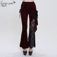 A pair of asymmetric gothic flared pants. The pants are elastic asymmetrical mesh panels. The mesh panels are embellished with lace and floral pattern. The flower is removable. Product specifications:Style: GothicMaterial: Polyester 80%, Polyamide 15%, Spandex 5% Velvet Bell Bottoms, Red Goth, Rock Style Outfits, Gothic Pants, Red Gothic, Red Flare, Black Pants Men, Rock Outfit, Lace Splicing