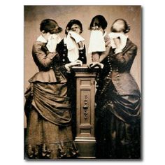 an old black and white photo of three women standing next to each other