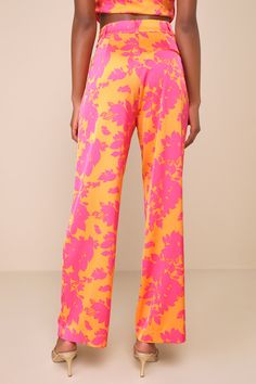 Having perfect style is as easy as throwing on the Lulus Instinctive Glam Pink and Orange Floral Straight Leg Pants! Sleek lightweight satin boasts an eye-catching floral print as it shapes a high waist, belt loops, and a hidden zip fly with top clasp closures. Pleated details and front diagonal pockets accent the slim-fit legs, ending at ankle-length hems. Decorative welt pocket at back. Pair with the matching top for a complete look! Fit: This garment fits true to size. Length: Ankle length. S Chic Floral Print Wide Leg Pants, Chic Floral Print Wide Leg Full Length Pants, Chic Floral Print Full-length Wide Leg Pants, Chic Full-length Floral Wide Leg Pants, Chic Silk Printed Bottoms, Chic Full-length Floral Print Pants, Silk Wide-leg Pants With Floral Print, Silk Floral Print Straight Pants, Chic Silk Printed Pants