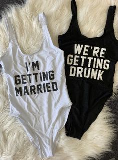 two shirts that say we're getting married and i'm getting married