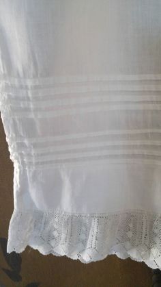 "50s gorgeous white cotton long under dress for a Christening / Baptism. Sleeveless top with two tiny little pearly buttons at the back. Waistband with the long skirt flaring out from it. Bottom of skirt has little tiers of fabric and then a lovely cotton lace trim at the hem. across chest 19\" around, waist 19\" around, skirt length 30\", dress length total 37\"" Baby Christening, Unisex Baby Clothes, Gender Neutral Baby Clothes, Under Dress, Lace Hem, Pink Suede, Dress With Lace, Cotton Baby, Sheer Sleeves