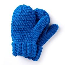 a pair of blue knitted mittens laying on top of each other