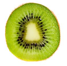 a kiwi cut in half on a white background