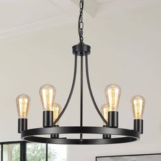 This modern farmhouse dining chandelier has a 59.05 in hanging chain so you can customize the length to get the perfect height. If you are looking for a ceiling for sloped ceiling, slanted ceiling, flat ceiling or vaulted ceilings, this wagon wheel chandelier will be a good option. This Lighting Fixtures Hanging can make your home more retro farmhouse style, which is perfect for a farmhouse, dining room, living room, kitchen, barn, living room, entryway or foyer. Farmhouse Dining Chandelier, Wagon Wheel Light, Black Wagon Wheel Chandelier, Farmhouse Chandelier Foyer Homeclick.com, Farmhouse Black Chandelier Home Depot, 2 Tier Wagon Wheel Chandelier, Wagon Wheel Chandelier Black, Flat Ceiling, Chandelier For Kitchen