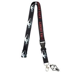 a black and white dog leash with red lettering on it