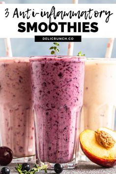 two smoothies with blueberries and an apple on the side