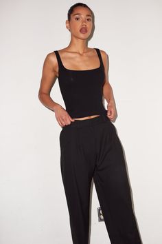 LNA Essentail Ribbed Scoop Tank in Black Black Ribbed Tops, Black Stretch Ribbed Tank Top, Black Scoop Neck Top For Work, Black Fitted Tank Top For Work, Everyday Black Fitted Tank Top, Black Fitted Tank Top For Everyday, Sleek Black Tank Top, Chic Black Tank Top With Minimal Stretch, Black Ribbed Tank Top