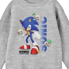 Stay comfy and cozy while you celebrate your favorite video games with this Sonic Frontiers shirt. The shirt features an image of Sonic surrounded by koco creatures while blue letters spell out his name. The game's logo appears in black letters below the image. The shirt comes in an athletic heather long sleeve crew neck. Fans of the Sonic Frontiers video games will love this comfy shirt. Blue Cartoon Print Sweatshirt For Streetwear, Blue Casual Sweatshirt With Character Print, Blue Cotton Sweatshirt With Character Print, Casual Blue Sweatshirt With Character Print, Playful Crew Neck Sweatshirt With Character Print, Gamer Style Character Print Tops For Streetwear, Themed Long Sleeve Tops With Graphic Print, Winter Character Print T-shirt For Fans, Blue Crew Neck Sweatshirt With Sublimation Print