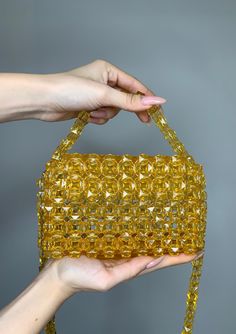 Crystal yellow bead bag, Bead shoulder bag, Women Bead bag, Bead Bag, yellow Bead bag, Yellow Crystal Bead Bag,yellow shoulders bag, Women handbags Dimensions - Width: (17cm.) - Height: (17cm.) - Depth: (6cm.) - Length of handle 100cm Bags are 100% handmade.This size making it perfect to hold your keys, cards, money and smartphones. I hope you collect great memories with this bag. SHIPPING - This clutch is made and ready to ship - Ships worldwide from Kiev,Ukraine - Processing time prior to shipping is 1-2 days - Free shipping Feel free to contact me for any question, by hitting the «Message the seller» button at the end of this page Yellow Crossbody Shoulder Bag For Evening, Yellow Shoulder Bag For Evening, Yellow Rectangular Evening Bag For Party, Yellow Rectangular Shoulder Bag For Evening, Yellow Crossbody Bag For Party, Rectangular Bags With Gold Beads For Gifts, Yellow Evening Crossbody Shoulder Bag, Party Rectangular Bag With Gold Beads, Yellow Handheld Evening Bag