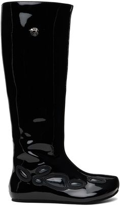 Knee-high patent faux-leather boots in black. · Pinched seam at vamp · Logo hardware at collar · Graphic appliqués at outer side · Bonded jersey lining · Crepe rubber sole Available exclusively at SSENSE. Supplier color: Black Faux Leather Boots, Black Boots Tall, Tall Boots, Fast Fashion, Lace Up Boots, Black Boots, Leather Boots, Knee High, Apparel Accessories