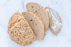 two loaves of bread sitting on top of a white counter