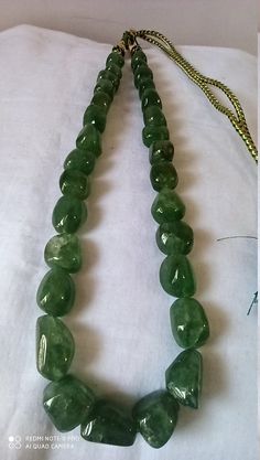 Awesome 20 '' 700 Carat Natural Green Strawberry Quartz Smooth Oval Nugget Beads Gemstone Necklace 100% Natural With Adjustable Cord Necklace Stone : Natural Green Strawberry Quartz Shape :- Oval Necklace - 20 inch Size :- 12x14 mm to 13x22mm Weight :- 700 carat Polish :- Handmade Purity :- 100% Natural Gemstone color - green makes a great gift for your loved ones. It is known as the 'love stone' as the message it emits is the strong vibration of unconditional love, joy, warmth and healing. As q Spiritual Green Necklace With Oval Beads, Green Oval Gemstone Bead Necklace, Green Oval Beads Spiritual Necklace, Green Oval Beads With Natural Stones, Green Polished Beads Amulet Necklace, Pumpkin Necklace, Green Strawberry, Carnelian Bracelet, Oval Necklace