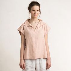 Natural linen blouse for women. This short sleeve blouse is carefully handmade of very soft natural medium weight linen fabric. * 100% linen * machine washable * color in the pictures - pale peach BLOUSE SIZE: ------------------ * XS - recommended body fit bust 28.5"-32" / 72-82cm waist 21.5"-32" / 55-82cm hips 28.5"-34" / 72-86cm height 61"-66" / 155-168cm - flat cloth measurements bust 33" / 84cm blouse length 23" / 58cm + 1.6"/ 4cm collar ------------------ * S - recommended body fit bust 32" Peach Short Sleeve Blouse For Summer, Peach Short Sleeve Summer Blouse, Feminine Pink Linen Top, Pink Linen Blouse For Summer, Peach Short Sleeve Summer Tops, Summer Linen Short Sleeve Blouse, Feminine Relaxed Fit Linen Tops, Feminine Beige Linen Blouse, Casual Pink Linen Blouse