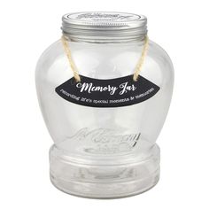 a clear glass jar with a label on the lid that says mommy's tea