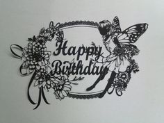 a happy birthday card with butterflies and flowers on the front, surrounded by words that spell out'happy birthday '