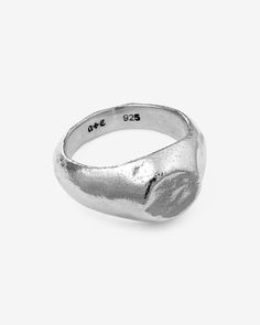 Energised with the resolve to uphold every pledge, the Oath Signet Ring safeguards all solemn commitments. Crafted from 925 Sterling Silver, this signet ring introduces a circular facade that gracefully melds into its thick body, and features a polished, yet time-worn, hand-hewn texture. This demi-fine piece is a versatile addition to any jewelry collection, suitable for all genders and expressions. Perfect for easy, everyday styling on its own or as a complement to any ring stack. Sold individu Thick Ring, Silver Signet Ring, Ring Stack, Gold Signet Ring, Detailed Ring, Studs Earrings, Demi Fine Jewelry, Ring Fit, Ring Size Guide