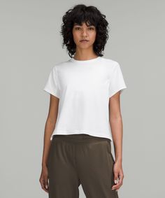 An everyday essential, elevated. A soft blend of cotton, lyocell, and linen makes this stretchy top a first choice, any day of the week. Designed for On the Move. An easy fit that floats away from your body:Not too short, not too long, just right around the waistband. 'Wash with like colours', 'Machine wash cold', 'Do not bleach', 'Tumble dry low', 'Do not iron', 'Do not dry clean', 'Imported'. Naturally Soft, Cotton-Blend Fabric. Body: 68% Cotton, 20% Lyocell, 8% Linen, 4% Elastane. Rib: 68% Co Lululemon Classic Fit Cotton Blend Tee, Work Capsule, Cooler Style, Short Sleeve Shirt Women, Summer Work, Stretchy Tops, Lululemon Women, Day Of The Week, First Choice