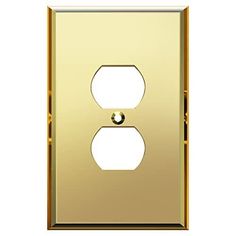 a golden light switch plate with two white outlets on the front and one black outlet in the back