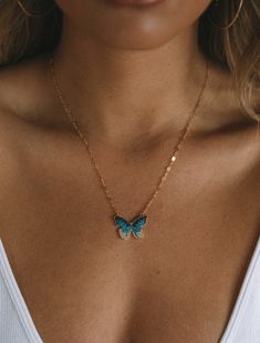 ~Appx 19'' long ~Butterfly charm ~18k gold filled charm & chain ~Clasp closure Elegant Blue Necklace With Butterfly Charm, Blue Gold-plated Charm Necklace With Adjustable Chain, Elegant Blue Butterfly Charm Necklace, Elegant Blue Butterfly Necklace With Charm, Dainty Blue Butterfly Jewelry, Blue Jewelry With Gold Chain As Gift, Blue Jewelry With Gold Chain For Gift, Blue Gold Chain Jewelry Gift, Dainty Blue Charm Necklace With Adjustable Chain