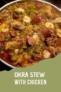 a large metal pan filled with lots of food on top of a stove covered in broth