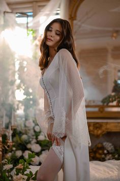 Fitted Lace Sleeves Wedding Robe, Fitted Wedding Robe With Lace Sleeves, Fitted Wedding Night Robe With Lace Sleeves, Fitted Robe With Lace Sleeves For Wedding Night, Ceremony Gown With Long Lace Sleeves, Long Sleeve Delicate Lace Wedding Night Dress, Long Sleeve Delicate Lace Dress For Wedding Night, Sheer Long Sleeve Robe For Wedding Night, Long Sleeve Dresses With Sheer Sleeves For Ceremony