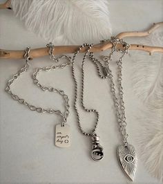 "Set of three silver chain layered punk rock style pendants, chunky evil eye heart chain necklace, 3D hand stacking pendant, ID tag choker Welcome to my shop! ✈️ DHL EXPRESS SHIPPING AVAILABLE, 1-3 BUSINESS DAYS DELIVERY! ✔️ PLEASE MAKE SURE TO SELECT IT, RIGHT BEFORE YOUR PURCHASE! ❗️ ❗️ DON'T FORGET TO ADD YOUR CELL # AT THE \"NOTE TO SELLER\" SECTION IF YOU CHOOSE DHL! BY FILLING YOUR CELL NUMBER YOU EARN THE BENEFIT TO CHOOSE BETWEEN 6 DIFFERENT DELIVERY OPTIONS! INSTRUCTIONS WILL BE SENT TO Punk Rock Style, Heart Chain Necklace, 3d Hand, Hand Necklace, Punk Rock Fashion, Skull Bracelet, Heart Chain, Estilo Punk, Leather Silver