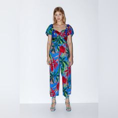 Zara Floral Print Jumpsuit Size: Xs New Without Tags! In Excellent Condition! Blue Short Sleeve Summer Jumpsuits And Rompers, Summer Fitted Zara Jumpsuits And Rompers, Chic Multicolor Short Sleeve Jumpsuits And Rompers, Casual Zara Jumpsuits And Rompers For Vacation, Blue Short Sleeve Summer Jumpsuit, Blue Tropical Print Jumpsuits And Rompers For Beach, Zara Fitted Jumpsuits And Rompers For Beach, Spring Blue Tropical Print Jumpsuits And Rompers, Fitted Multicolor Tropical Print Jumpsuits And Rompers