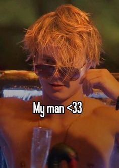 a shirtless man with sunglasses on his head and the words, my man 33