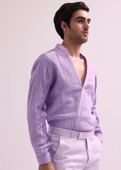 Elevate your evening ensemble with our expertly crafted three-piece tuxedo set. Crafted on a glamorous shimmer base. This lavender tuxedo is ornate with hand embroidered cutdana work and lapel detailing. Complemented with a pleated shirt and straight pants. This glitzy outfit will command everyone's attention. Dry-clean only if required. Slight variation in color is possible due to digital photography. Luxury Fitted Summer Sets, Luxury Fitted Sets For Summer, Tailored Spring Party Tuxedo, Tailored Tuxedo Sets For Gala, Spring Party Tuxedo Sets, Elegant Purple Long Sleeve Suits, Elegant Lavender Party Sets, Tailored Purple Set For Party, Tailored Purple Party Sets