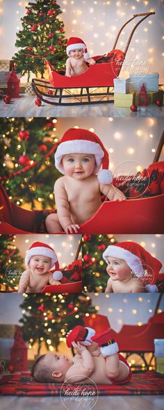 a baby in santa's hat sitting on a sleigh next to a christmas tree