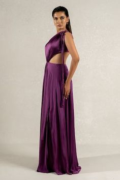 Purple one shoulder gown featuring side cuts with tie up on shoulder and waist. - Aza Fashions Elegant Side Open Fitted Dress, Elegant Fitted Side Open Dress, Elegant Fitted Dress With Side Open, Fitted Evening Dress With Side Open Design, Fitted Evening Dress With Side Open, One Shoulder Maxi Dress With Side Slits For Wedding, Gowns Purple, Purple Gowns, One Shoulder Gown