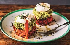 two pieces of food on a plate with a fork