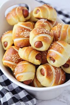 a bowl filled with pigs in a blanket