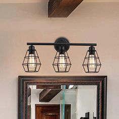 Industrial 3-Light Black Wall Sconce With Metal Cage Shade For Bathroom Industrial Bathroom Vanity Lights, Vanity Light Shade, Farmhouse Vanity Lights, Industrial Bathroom Vanity, Farmhouse Vanity, Black Vanity Light, Lights Black, Industrial Light Fixtures, Wall Mounted Lamps