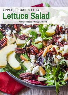 an apple pecan and feta lettuce salad is shown in a bowl