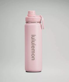 a pink insulated water bottle with the word unleaven written in black on it