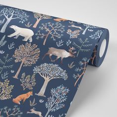 an animal themed wallpaper with trees and animals on it's navy blue background