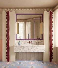 a bathroom with marble counter tops and purple trim