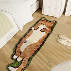 a rug with a dog on it in the middle of a room next to a bed