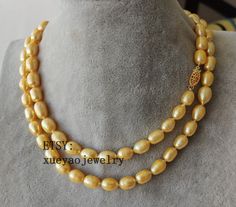 Welcome to my shop my dear friend. I hope you will like my jewelry, Please see the detail for this item: Pearl Jewelry: necklace Pearl Type: cultured freshwater pearl size: 8-9 mm Pearl Color: as the pictures length: 32inch if you need other length, could contact me please,thanks Note: 60 inch & 80 inch without clasps, if you need, also cn telll me please! About shipping: I will send out your order in 1-3 business days from China. 1, To United States, will use US E-packet shipping service , Yellow Pearl Necklace As Gift, Yellow Pearl Necklace Gift, Yellow Pearl Necklace For Gift, Pearl Long Necklace, Thanks Note, Black Freshwater Pearls, Pearl Jewelry Necklace, Cultured Pearl Necklace, Pearl Leather