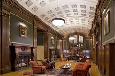 an ornately decorated living room with couches and chairs