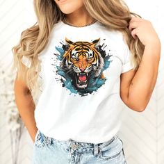 Express your unique style with this vibrant and eye-catching tiger graffiti t-shirt. Featuring a one-of-a-kind watercolor painting of a fierce tiger, this unisex tee is perfect for animal enthusiasts. Made from high-quality materials, it offers both comfort and durability. Stand out from the crowd with this edgy and captivating design that will surely spark conversations. Whether you're looking for a gift or want to add some wild flair to your wardrobe, this t-shirt is a fantastic choice. Embrace the untamed vibes and let your personality shine with this colorful and captivating tiger shirt. 🎨 Vibrant Design: Stand out with the colorful and eye-catching tiger graffiti artwork. ✨ Unique and One-of-a-Kind: Each t-shirt is a unique piece, handcrafted with care and attention to detail. 👕 Uni Short Sleeve Tiger Print T-shirt For Summer, Tiger Print Short Sleeve T-shirt For Summer, Tiger Print Crew Neck Graphic Tee, Cotton Graphic Tee With Tiger Print, Casual Cotton T-shirt With Tiger Print, Casual Cotton Tiger Print T-shirt, Graphic Tee With Tiger Print And Short Sleeves, Short Sleeve Graphic Tee With Tiger Print, Tiger Print Short Sleeve Graphic Tee