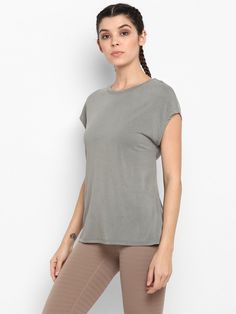 Lunges? I thought you said lunches - either way the cute and comfortable Shanti split back has you covered for both. The split back layer provides extra breathability to the T-shirt so you can breeze your way to the finish line. Soft luxurious hand feel that adds comfort and style. Soul of the T-shirt Moss green colour Fabric engineered to be ultra soft, lightweight and allow airflow Luxurious feel Sweat wicking Great shape retention Breathable and comfortable The labels have been directly print Green Colour, Finish Line, Moss Green, Fabric Color, Gym Workouts, Open Shoulder Tops, Tunic Tops, Split, T Shirts For Women