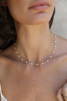 "This beautiful pearl Beaded Chain layered necklace is chic and effortless. Layer this necklace with the same style chain or with any other gold filled or silver necklaces. We love this necklace because it will go with your everyday and every-night wear! Its casual yet stunning. ✤ Available in 14k Gold Filled or Sterling Silver ✤ 4 mm Swarovski pearl ✤ Hand wire with gold filled or sterling silver ✤ Tarnish resistant ✤ Safe for sensitive skin ✤ Available sizes * Please choose in drop down box * Silver Necklace Stack Dainty, Dainty Pearl White Beaded Necklaces With Pearl Chain, Delicate Everyday Beaded Necklace With Pearl Chain, Dainty Pearl Necklace With Beaded Chain, Chic Pearl Necklace With Beaded Chain, Minimalist Pearl Chain Beaded Necklace For Wedding, Dainty Pearl Chain Layered Necklace, Dainty Pearl Chain Beaded Necklace For Weddings, Dainty Beaded Chain Necklace For Wedding