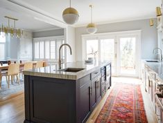 Kitchen Remodel with Modern Finishings and Gold Hardware Chicago Interior Design, Large Kitchen Island