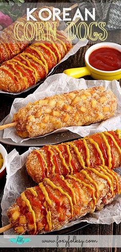 korean corn dogs on skewers with ketchup, mustard and dipping sauce